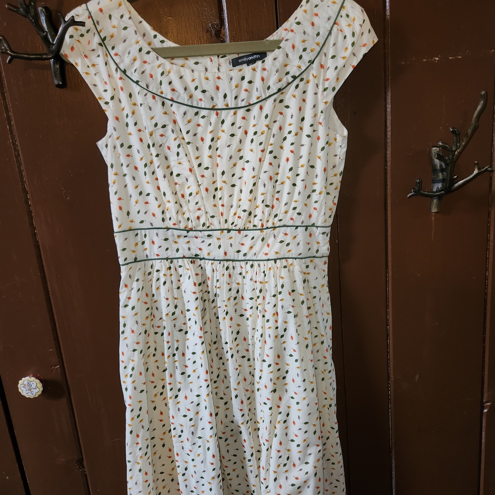 Elegant White Dress with Green Accents